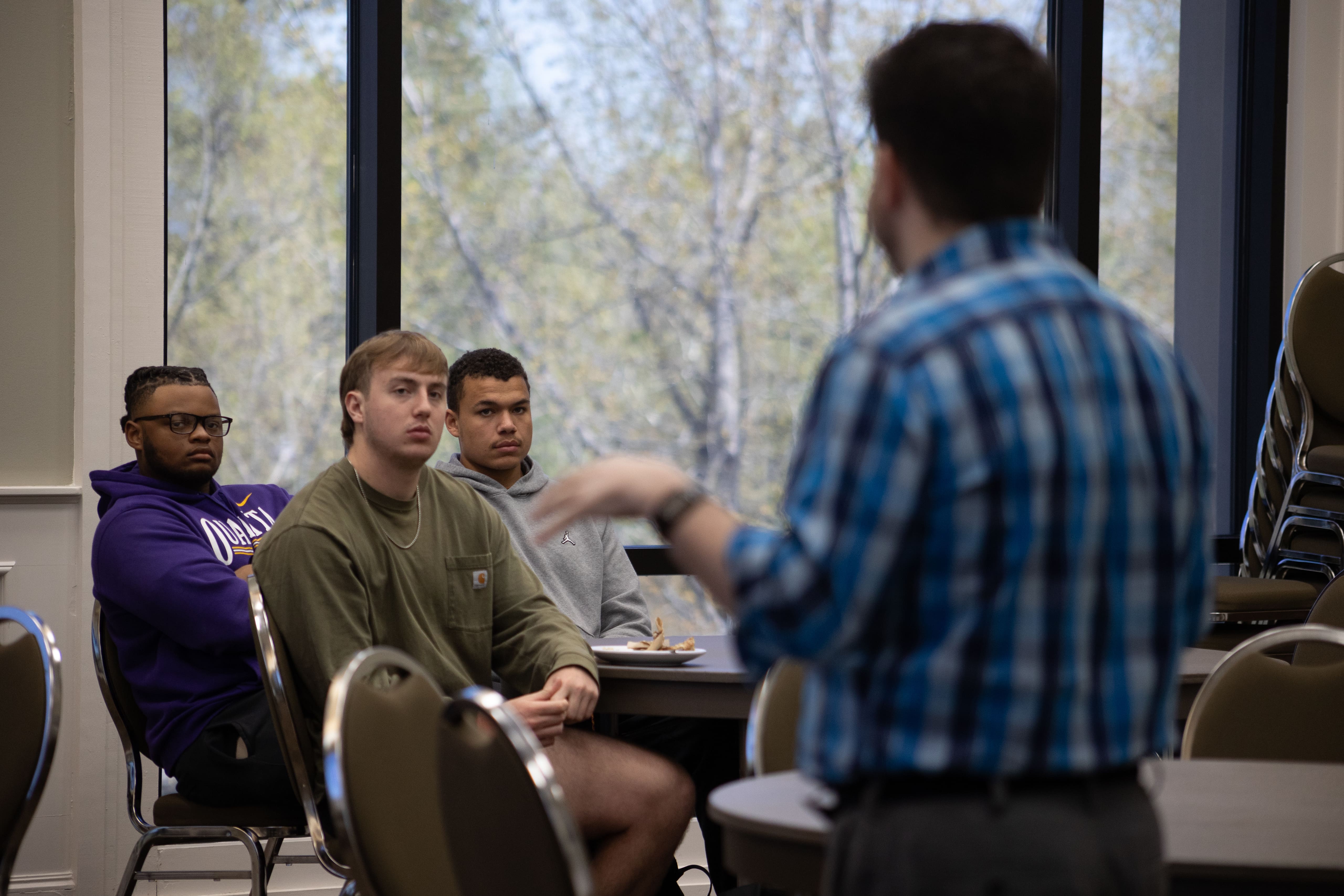 students listen to speaker