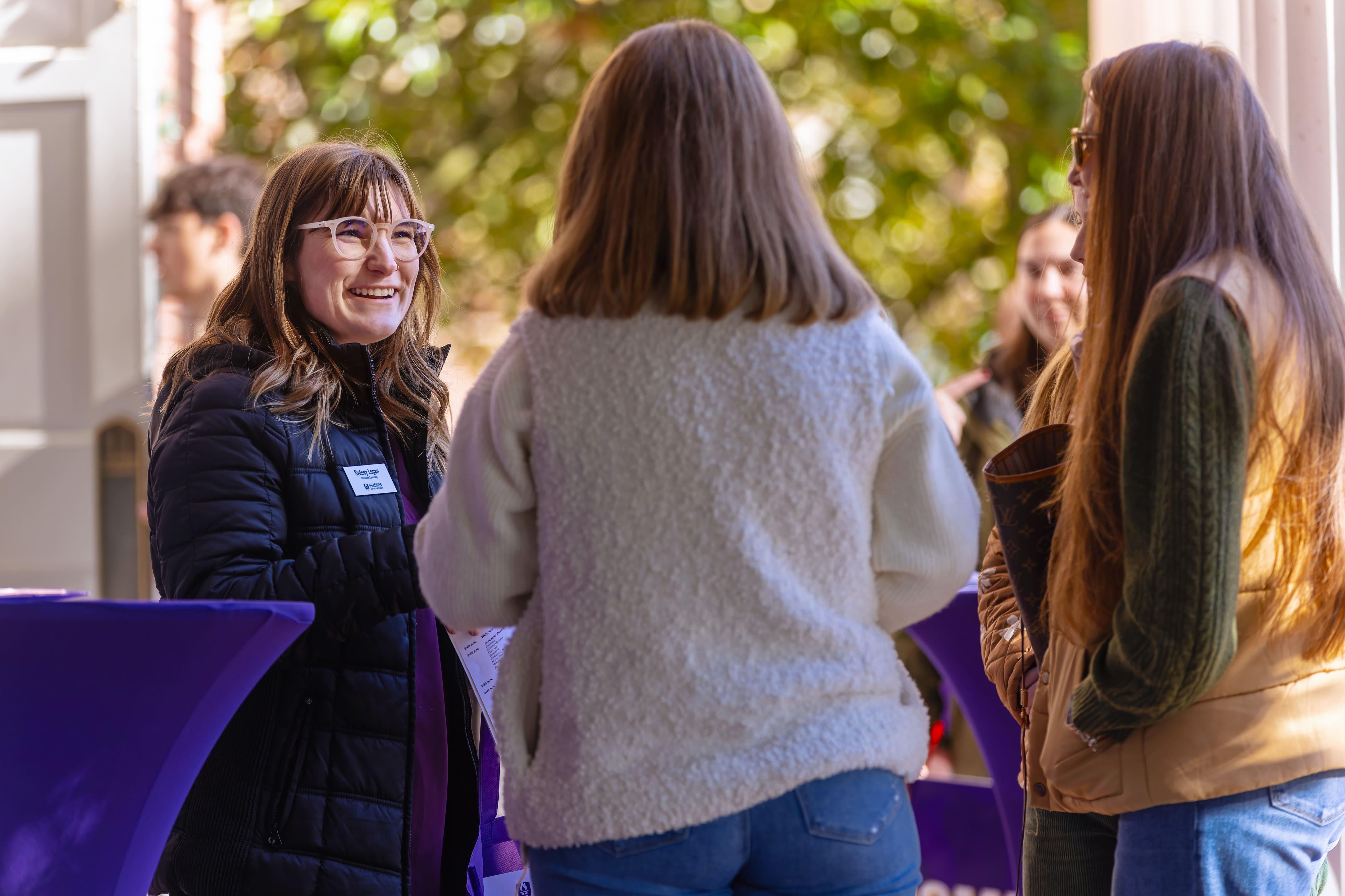 Admissions counselor with family